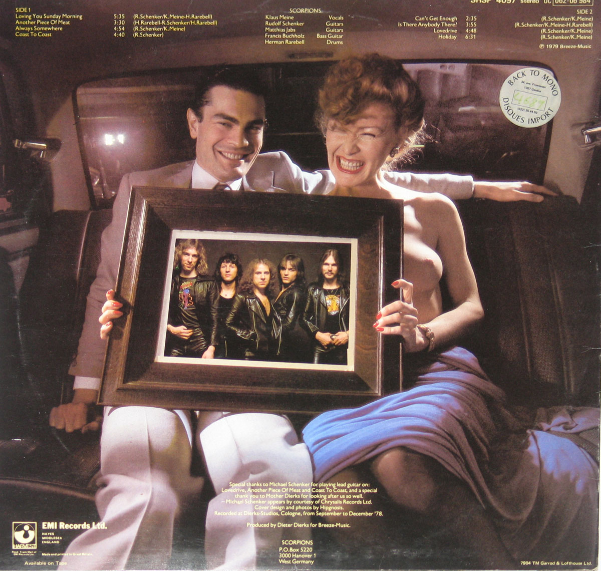 Back cover of Scorpions’ 1979 album Lovedrive featuring a man in a suit and a topless woman seated in the back of a car holding a framed photo of the band members in leather jackets; album tracklist, credits, and production details visible in the design.